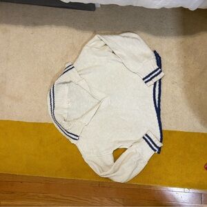 South moon under collared sweater